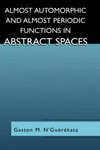 Almost automorphic and almost periodic functions in abstract spaces